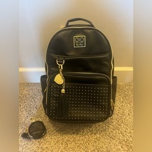 Itzy Ritzy Chelsea + Cole gold and black diaper backpack